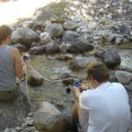 Teamwork: Mike and Sheila filtering some water for drinking.