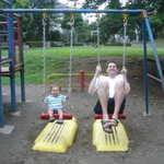 Sebastian and Will, on the swings.