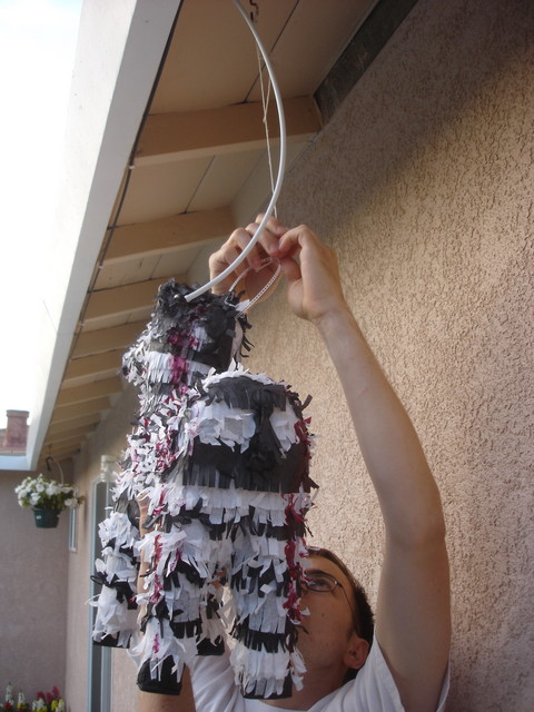 Chris hanging the "Bloody Pinata from Hell"