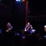 Decent shot of Rob Bochnik (guitar), Colm MacConIomaire (violin), and Glen Hansard