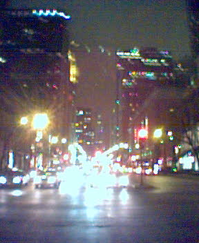an intersection (blurry and grainy)